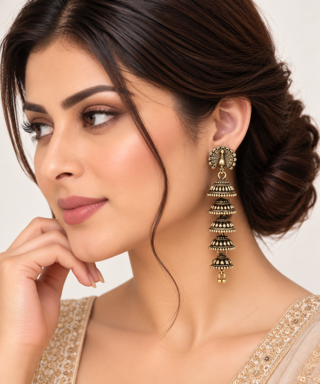 Regal Antique Gold Five-Tier Jhumka Earrings