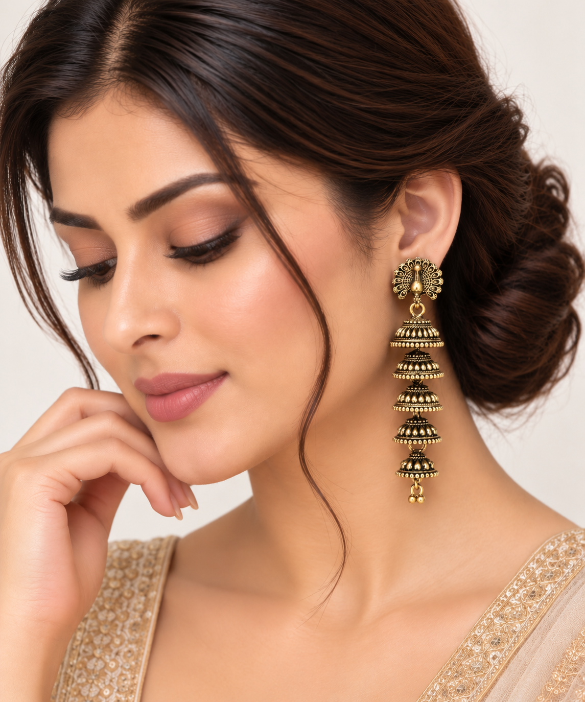 Regal Antique Gold Five-Tier Jhumka Earrings